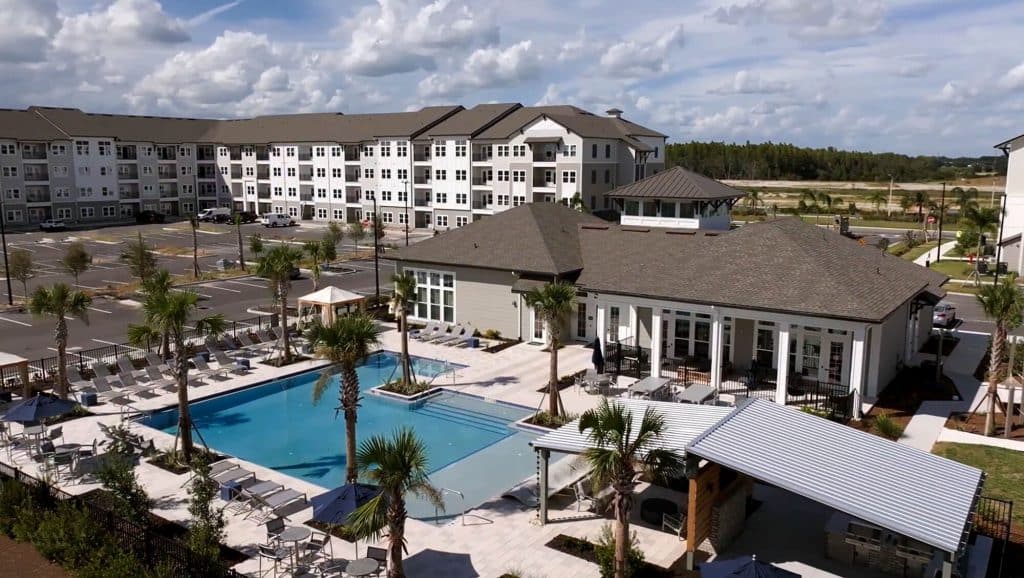 Luxury apartments in Wesley Chapel FL - Story Wesley Chapel exterior view of the apartments, clubhouse, and pool.